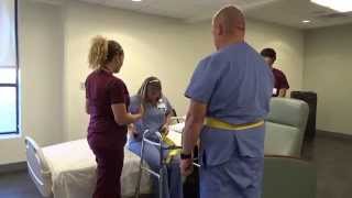 Physical Therapy Transfer Training  How To Transfer From Wheelchair To Bed [upl. by Wylen]